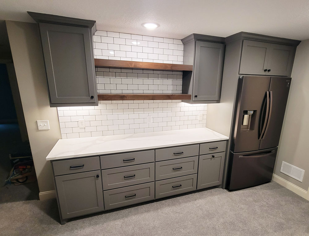 Entertainment room cabinets with full sized refrigerator