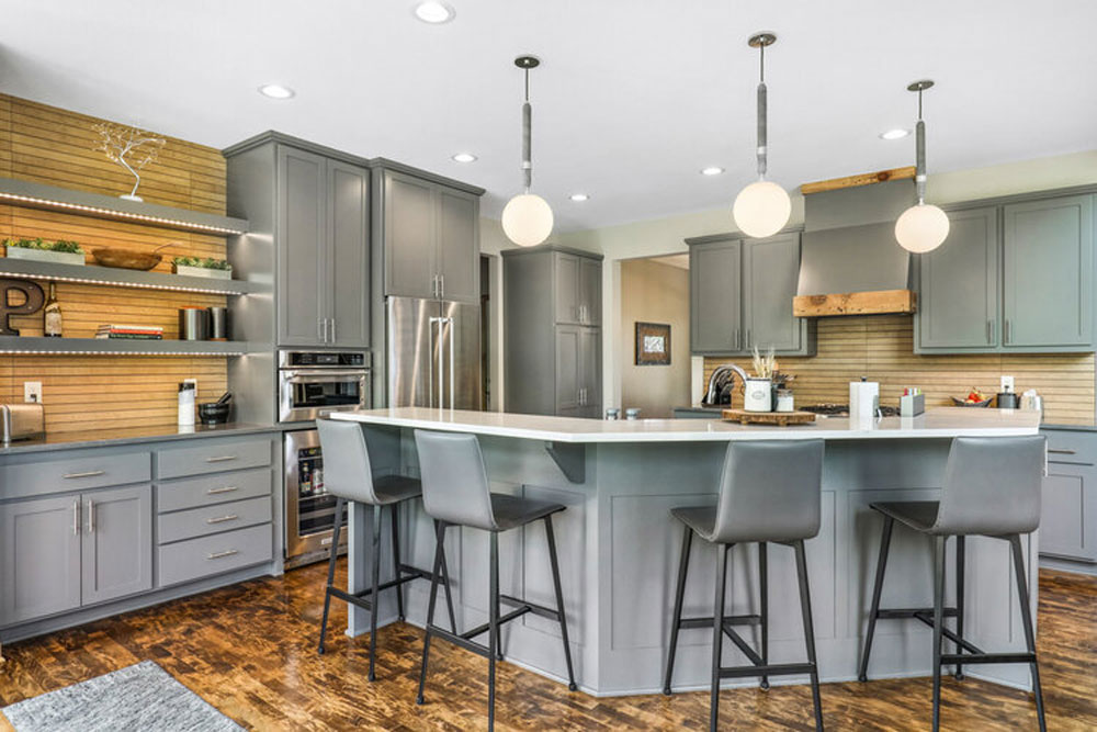 Grey cabinets/island with seating