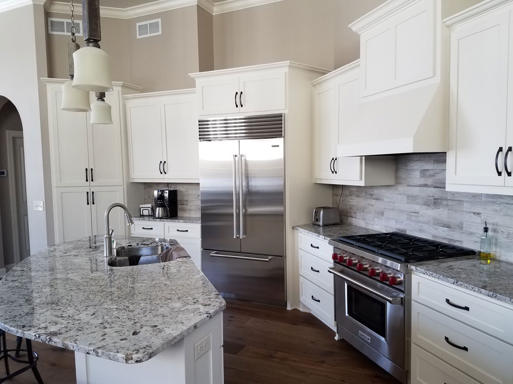 White cabinets/island w/seating