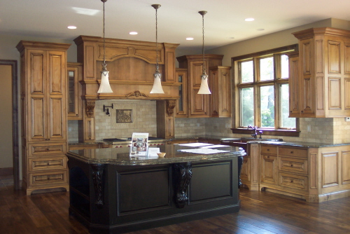 Two-tone wood cabinets and island