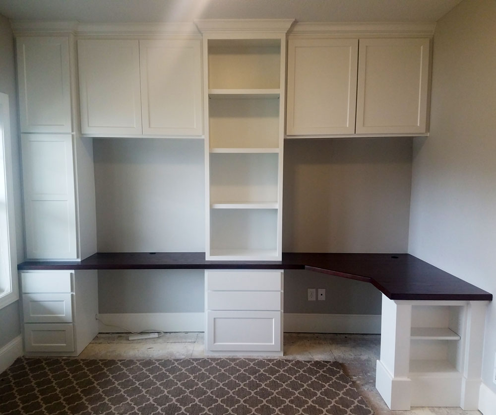 White corner desk with cabinets