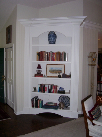 White built-in bookcase